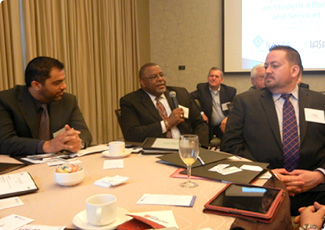 Participants from various countries having group discussion