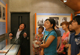 Tour of Malaysian high school co-op; members themselves provide services.