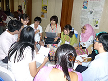 Students from Asian countries having group discussion